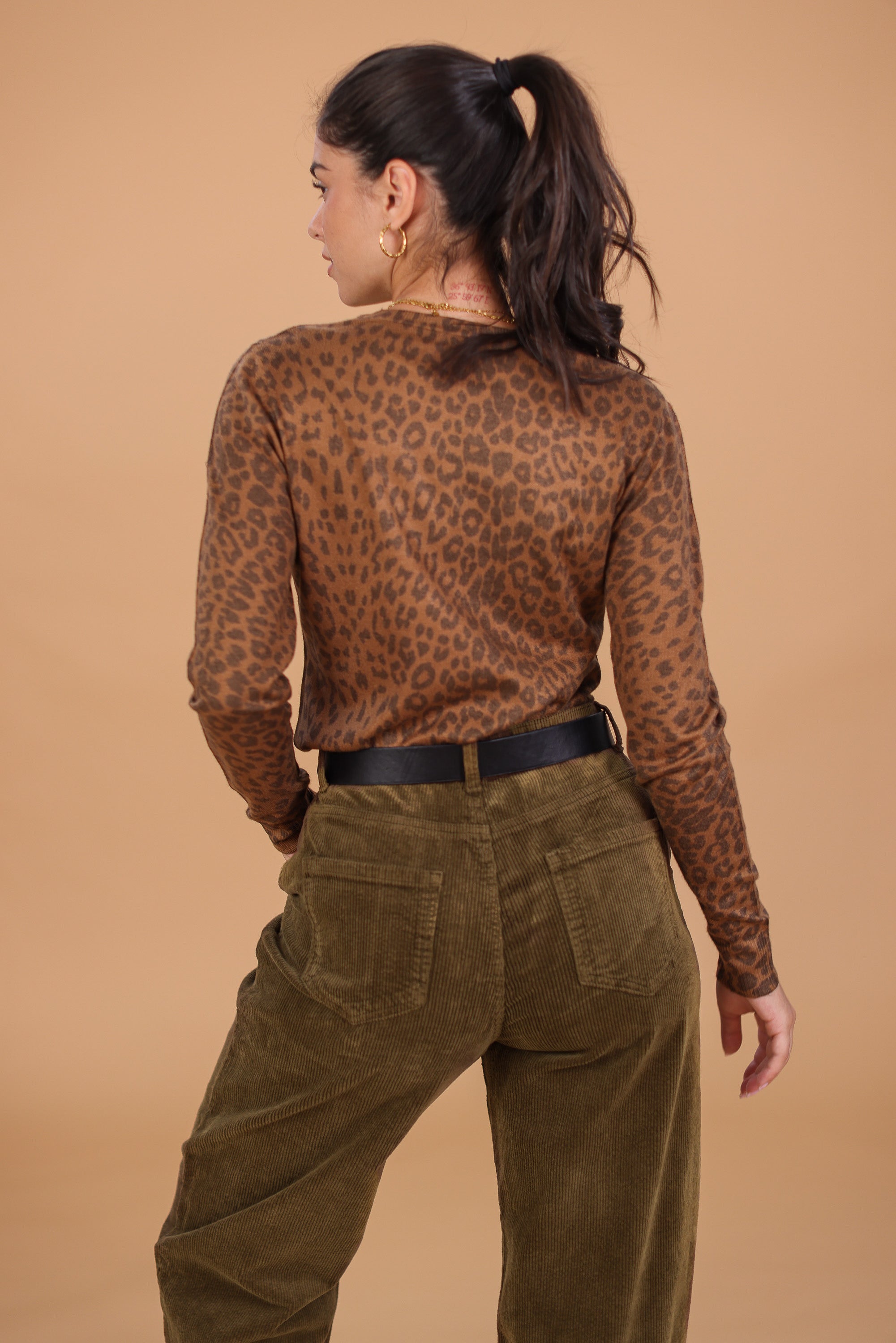 leopard print top and corduroy pants 
